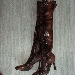 Snake skin thigh high boots